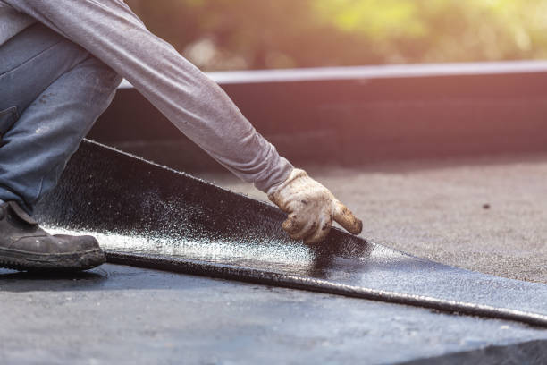 Professional Basement Waterproofing technician working in Abbyville, KS